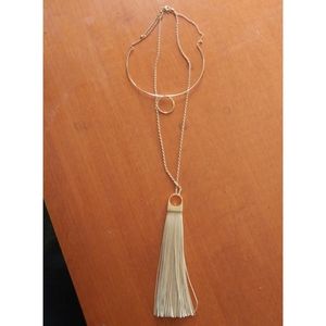 Gold collar necklace with long tassel